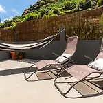 Modern Tropical Hideaway By Lovelystay