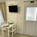 Modern Minimalist Studio With Essential Comfort